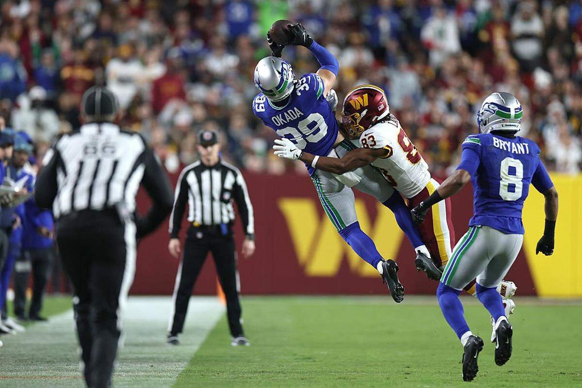 Seattle Seahawks safety Ty Okada (39) intercepts a pass intended for Washington Commanders wide receiver Jaylin Lane (83) during the second quarter in the game at Northwest Stadium on November 02, 2025 in Landover, Maryland. (Photo by Scott Taetsch/Getty Images)