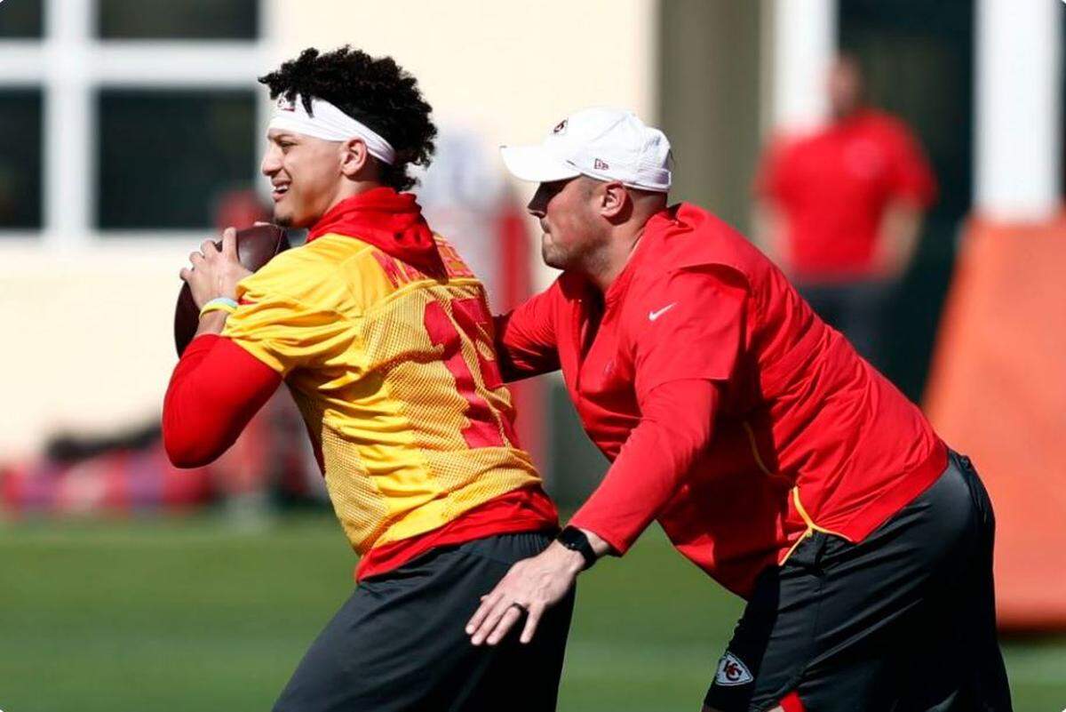 Kansas City quarterbacks coach Mike Kafka, here working with Patrick Mahomes (left), is reportedly on Pete Carroll’s list to talk to about the Seahawks’ coaching opening at offensive coordinator.
