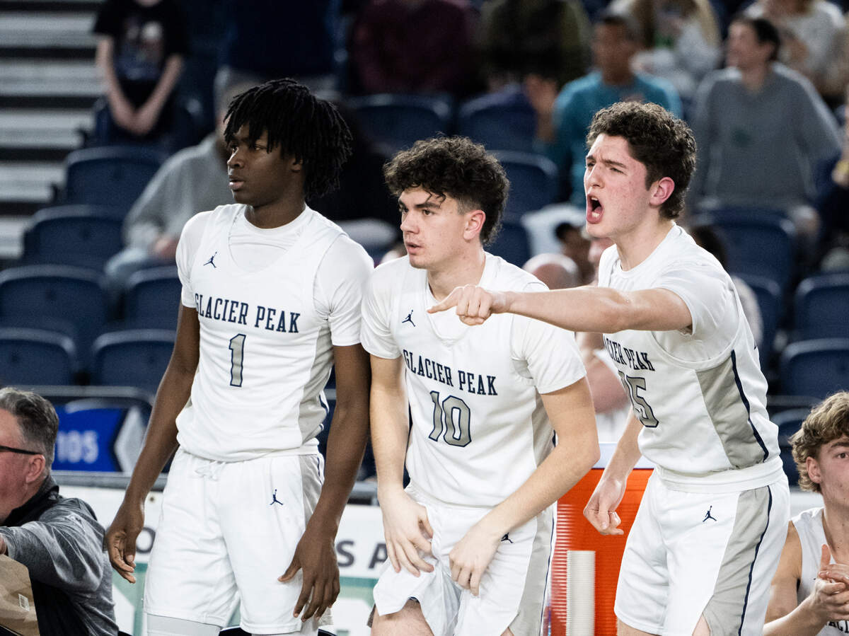 Glacier Peak’s bench reacts to a score against Camas during the first round of the Class 4A state tournament game at the Tacoma Dome, on Wednesday, Feb. 28, 2024, in Tacoma, Wash.