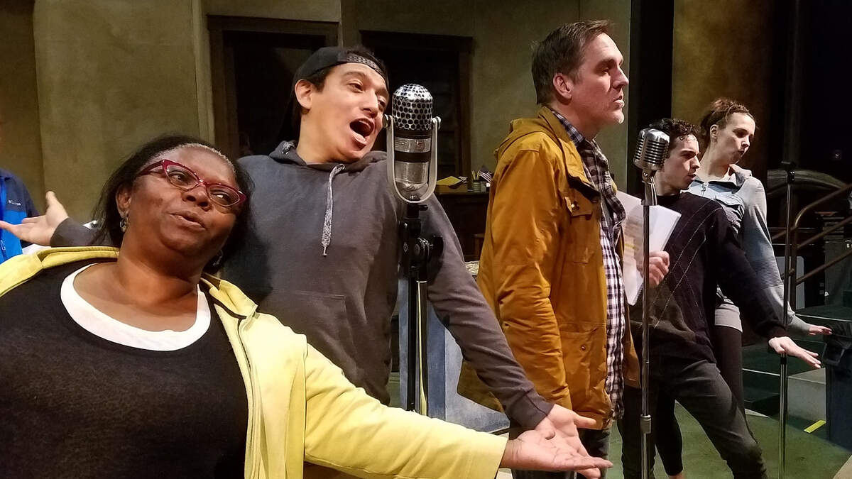From left to right: Edsonya Charles as Ann Collier, Miguel Pineda as B.J. Gibson, Bruce Haasl as Clifton Feddington, Xander Layden as Wally Ferguson, and Christie Murphy-Oldright as Ginger Brooks in ’1940s Radio Hour’ at Harlequin Productions.