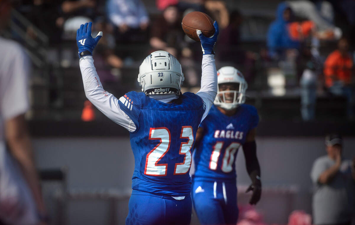 Graham-Kapowsin running back Leuma Teylor-Pomele celebrates his touchdown run with Eagles teammate Jabez Woods during Saturday’s football game against the Curtis Vikings at Art Crate Field in Spanaway, Washington, Oct. 8, 2022. Graham-Kapowsin won the game, 24-19.