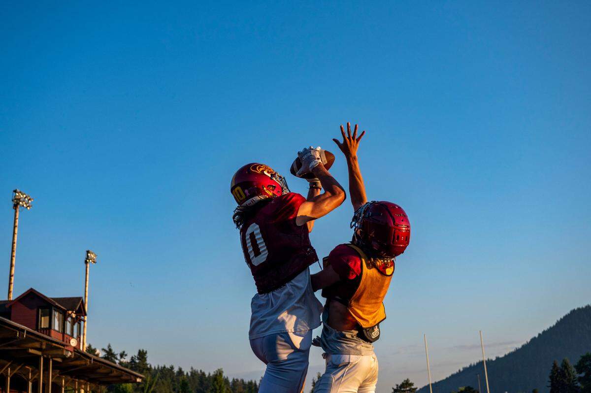 Enumclaw receiver Garrison Shatswell catches a pass in the endzone during individual drills on Wednesday, Aug. 24, 2022, in Enumclaw, Wash.