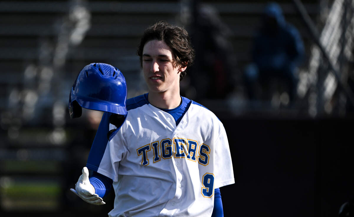 Stadium’s Tristan Luxenberg (9) flips his helmet after scoring a run against Mount Tahoma during the game at Heidelberg Field, on Tuesday, April 9, 2024, in Tacoma, Wash.