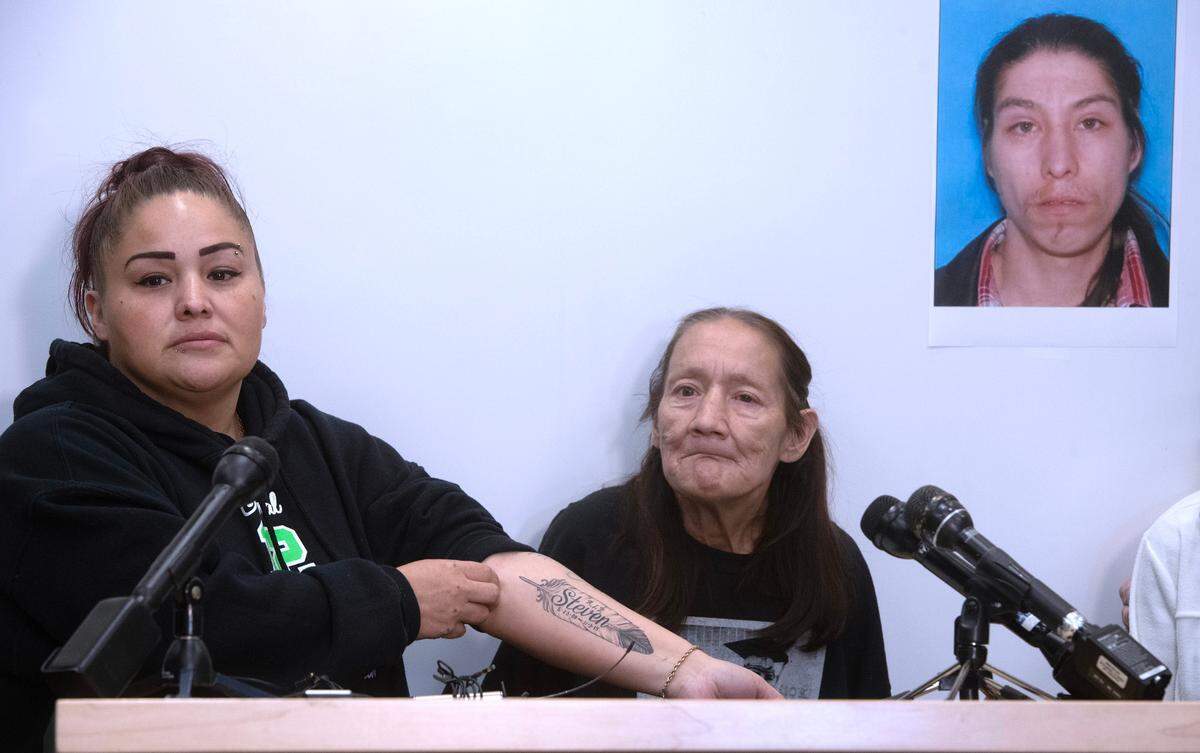 Selina Ramirez, the sister of homicide victim Steven Speakman, shows a tattoo honoring her brother as she and her mother, Kimberly Nystrum, ask for the public’s help during a press conference at the Tacoma Police Department in Tacoma, Washington, on Thursday, June 1, 2023. Police and family members are asking the public for any information that could help solve the 2015 shooting death of the developmentally disabled man near his home in Tacoma’s Hilltop neighborhood.