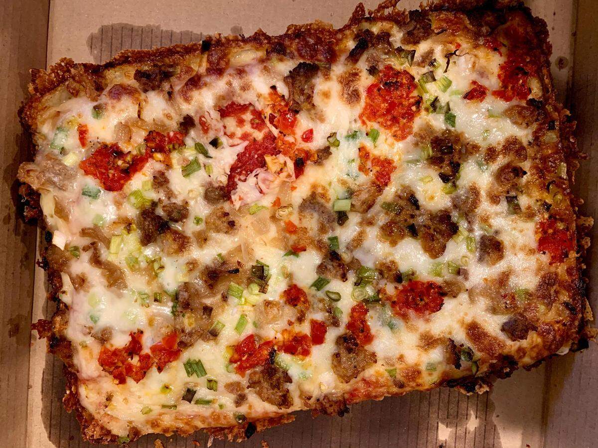 The Detroit-style square pizzas from Tacoma Pie are built to be crisped in the oven at home. 
