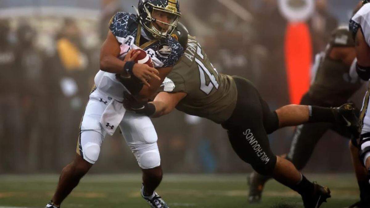 Army linebacker Jon Rhattigan, making a tackle in his team’s win over Navy at West Point, New York, in December, has reportedly signed a contract with the Seahawks as a rookie free agent. He will need a Department of the Army waiver of his active-duty service time to play if the Seahawks keep him into the 2021 season.
