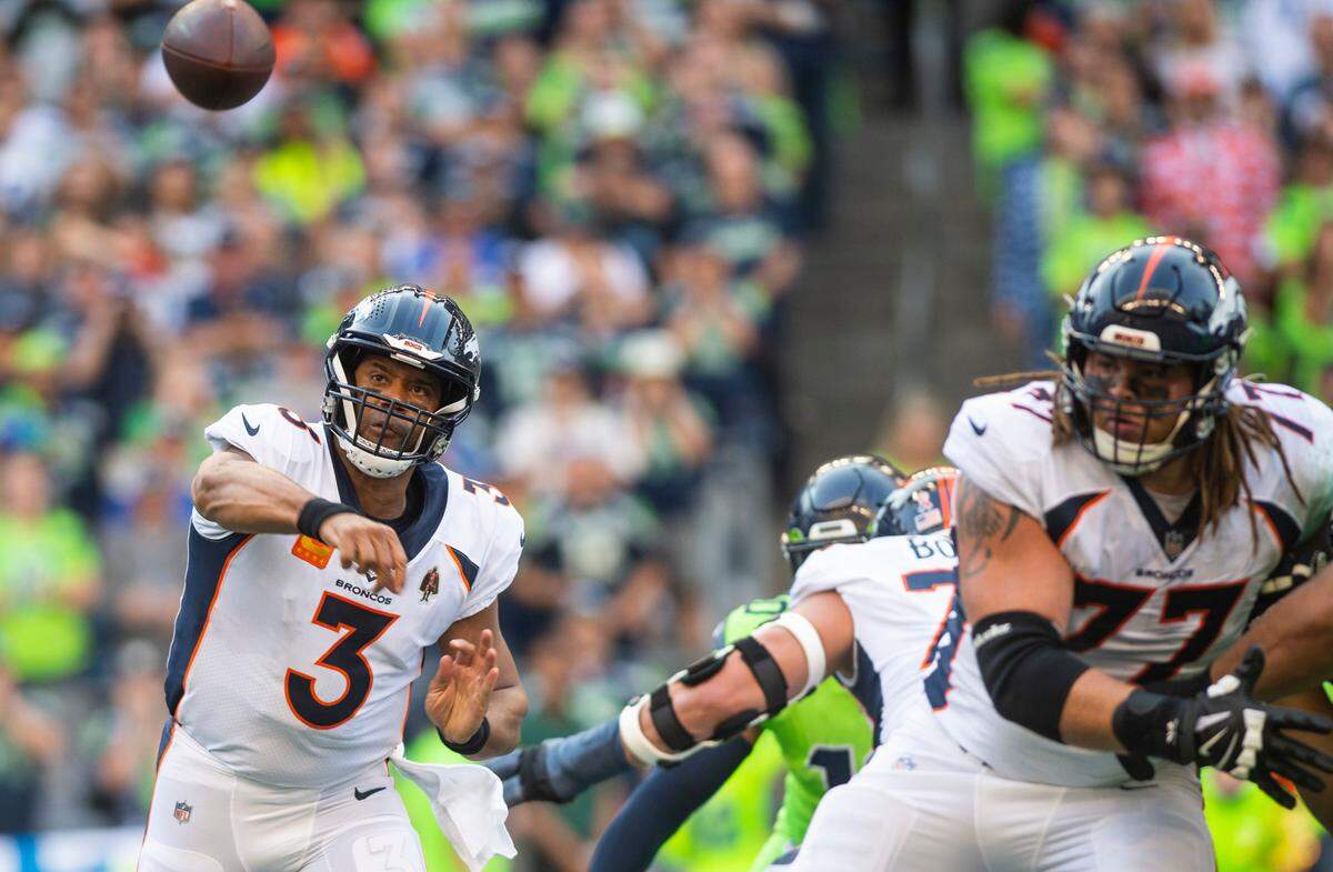 Denver Broncos quarterback Russell Wilson (3) passes the ball in the first quarter of an NFL game on Monday, Sept. 12, 2022, at Lumen Field in Seattle.
