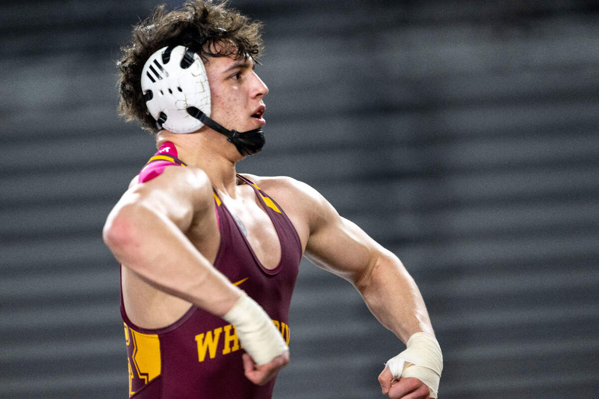 White River’s Caleb Dale throws a celebratory flex toward the crowd after defeating Southridge’s Quinton Ellison in Class 3A, 150-pound championship match on Friday, Feb. 21, 2025, at Mat Classic XXXVI at the Tacoma Dome in Tacoma, Wash.