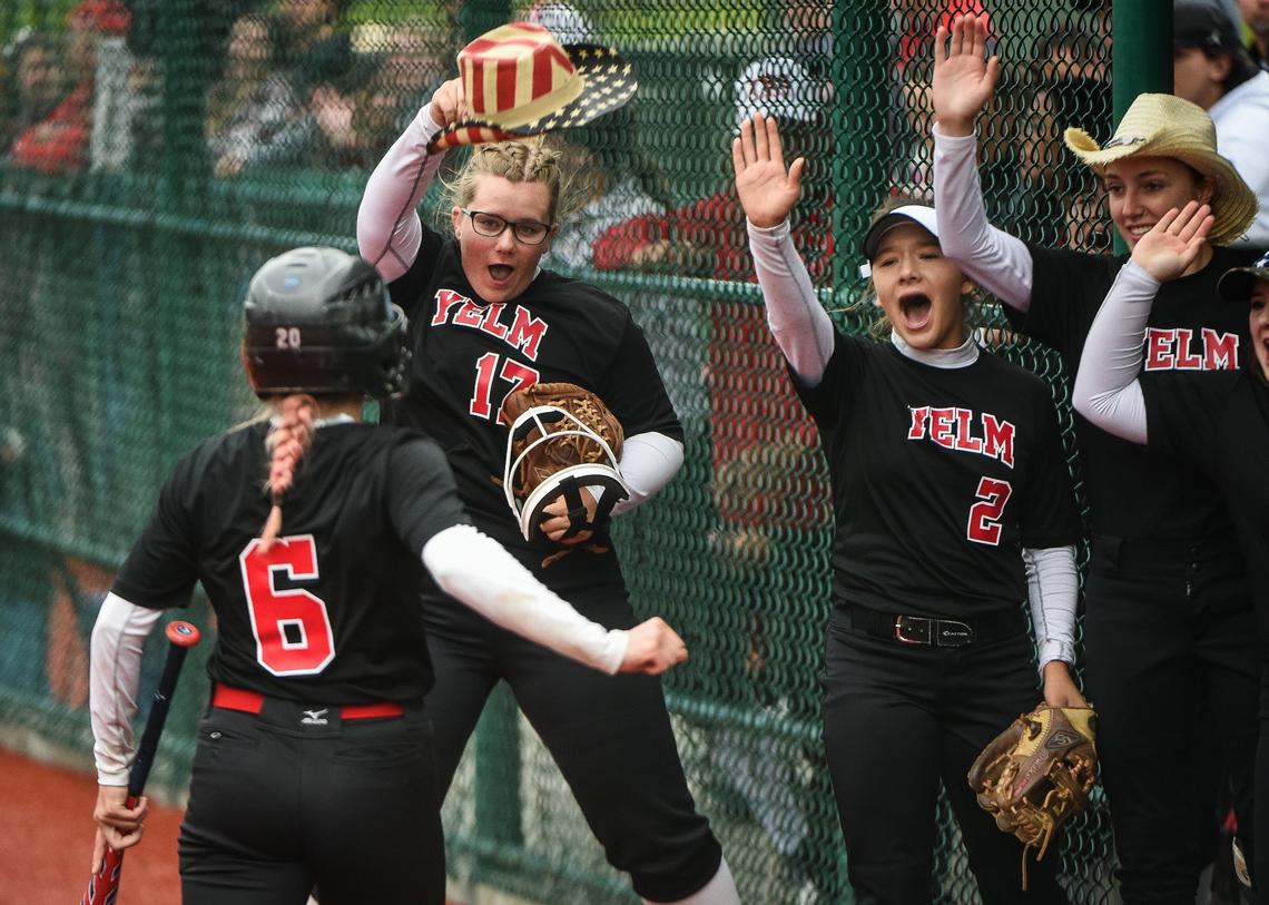 Yelm players including Hailey Brown (17) and Elena Castanon (2) celebrate a run by Cydney Jarvis (6). Yelm played Southridge in a softball game at the Regional Athletic Complex in Lacey, Wash., on Friday, May 24, 2019.