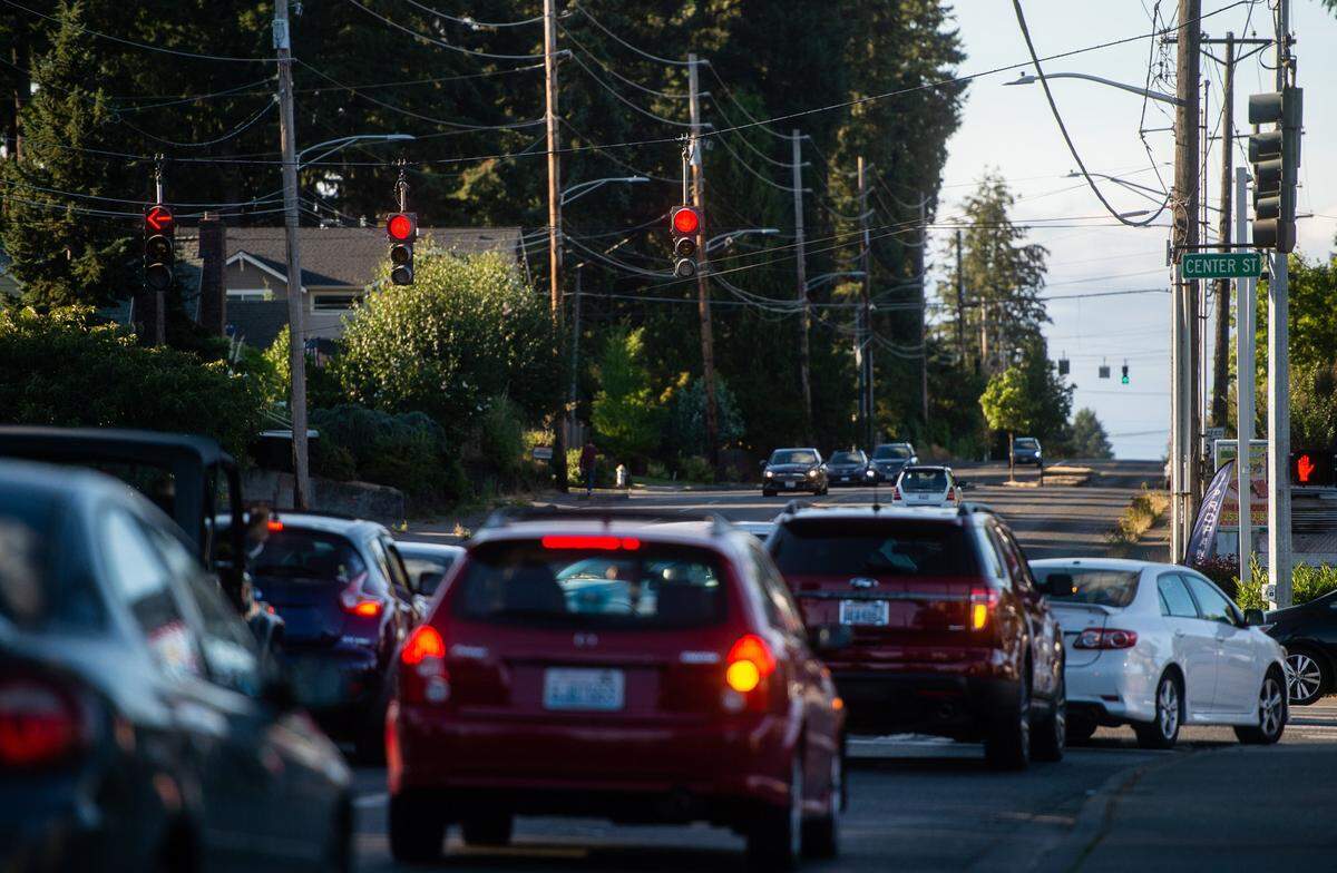 Cars begin to form a line as drivers wait to turn right onto Center Street from Orchard Street in Tacoma, Wash., on Thursday, Aug. 2, 2018. 
