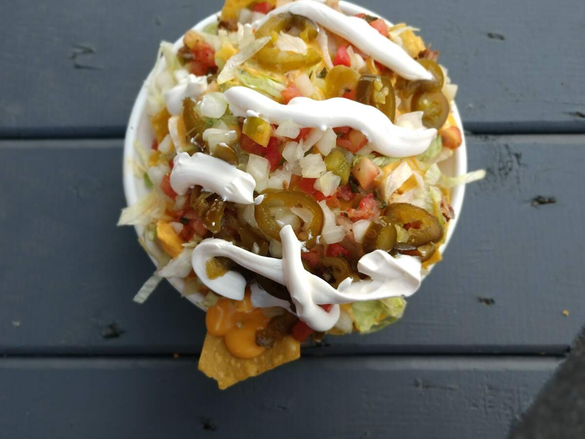 Grande nachos with pork from the La Familia Cantina stand at Cheney Stadium.