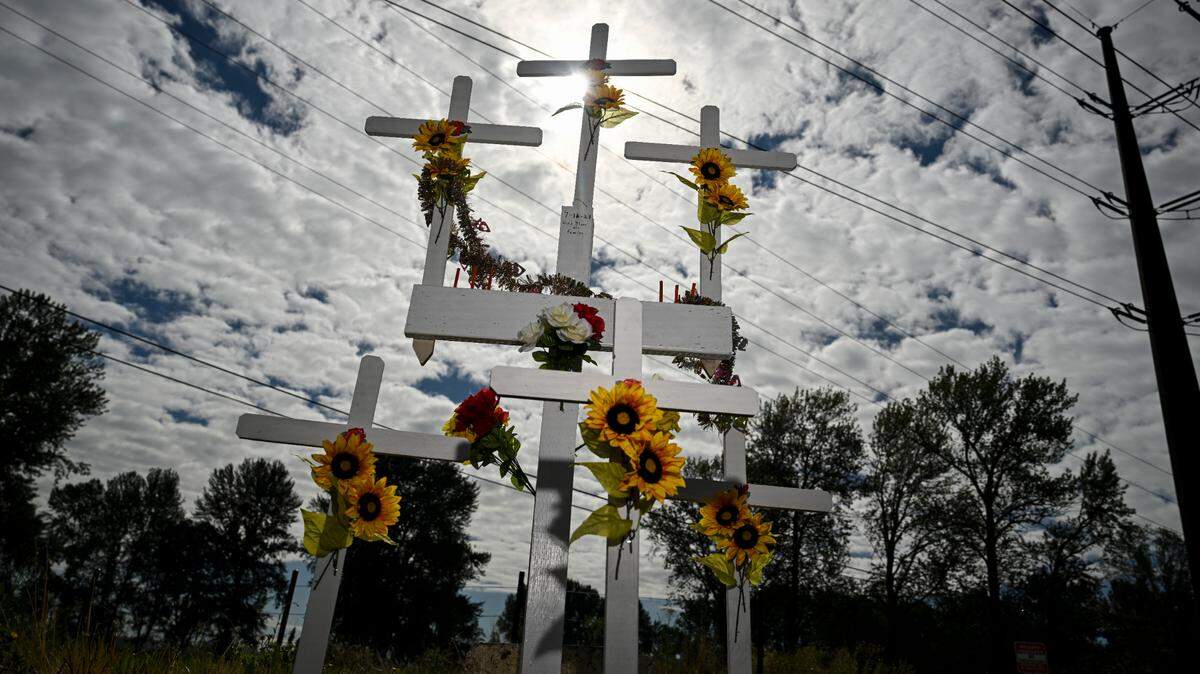 The sight of a memorial for a July 16 car Collins that left six people dead at WA-509 and Alexander Ave E., Friday, Aug. 11, 2023, in Tacoma, Wash.