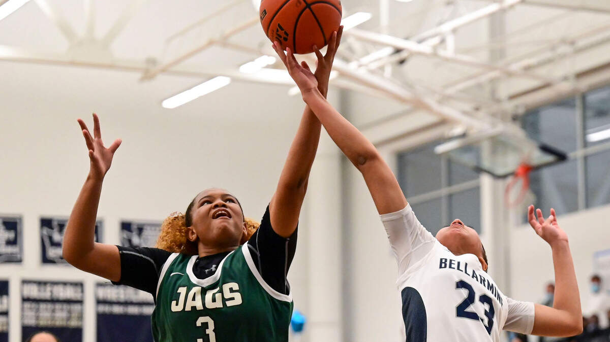 Emerald Ridge guard Maya Barnett (3) and Bellarmine Prep guard Jada Travis (23) fight for a rebound during the third quarter of a 4A South Puget Sound League game on Friday, Jan. 28, 2022, at Bellarmine Prep, in Tacoma, Wash.