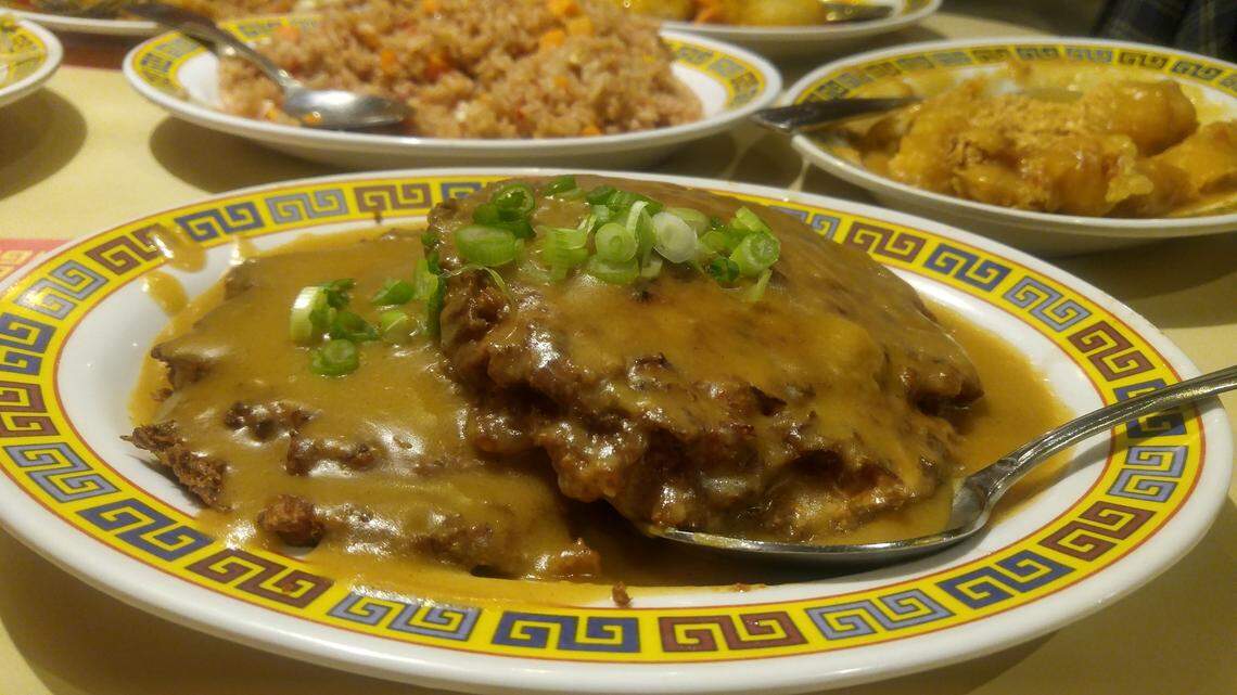 Egg foo young and assorted dishes from Hong Kong Chinese restaurant in Tacoma.