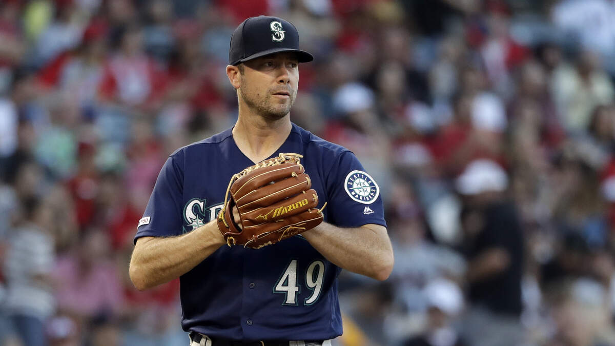 Seattle Mariners starting pitcher Wade LeBlanc pauses on the mound during the fourth inning of the team’s baseball game against the Los Angeles Angels Saturday, July 13, 2019, in Anaheim, Calif.