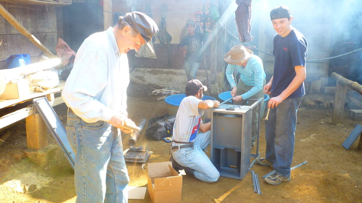 Ross Gaussoin and other volunteers working on clean-burning wood-stoves in Guatemala