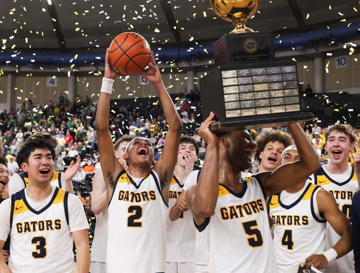 Annie Wright celebrates winning the 1A boys state basketball championship Saturday, March 8, 2025, at the Yakima Valley SunDome in Yakima, Wash.