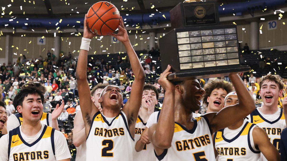 Annie Wright celebrates winning the 1A boys state basketball championship Saturday, March 8, 2025, at the Yakima Valley SunDome in Yakima. 