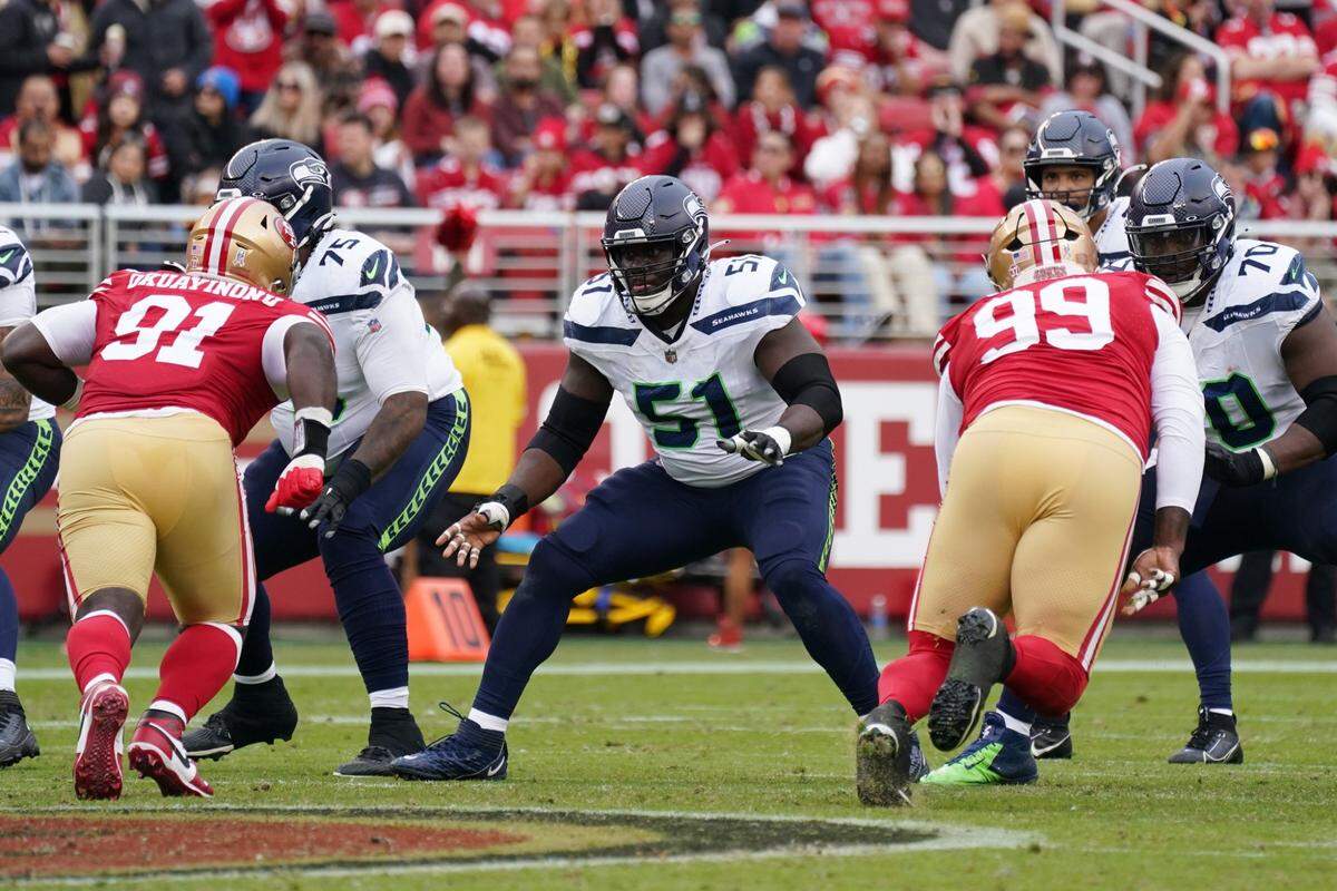Nov 17, 2024; Santa Clara, California, USA; Seattle Seahawks center Olu Oluwatimi (51) blocks San Francisco 49ers defensive tackle Sam Okuayinonu (91) in the second quarter at Levi's Stadium. Mandatory Credit: David Gonzales-Imagn Images