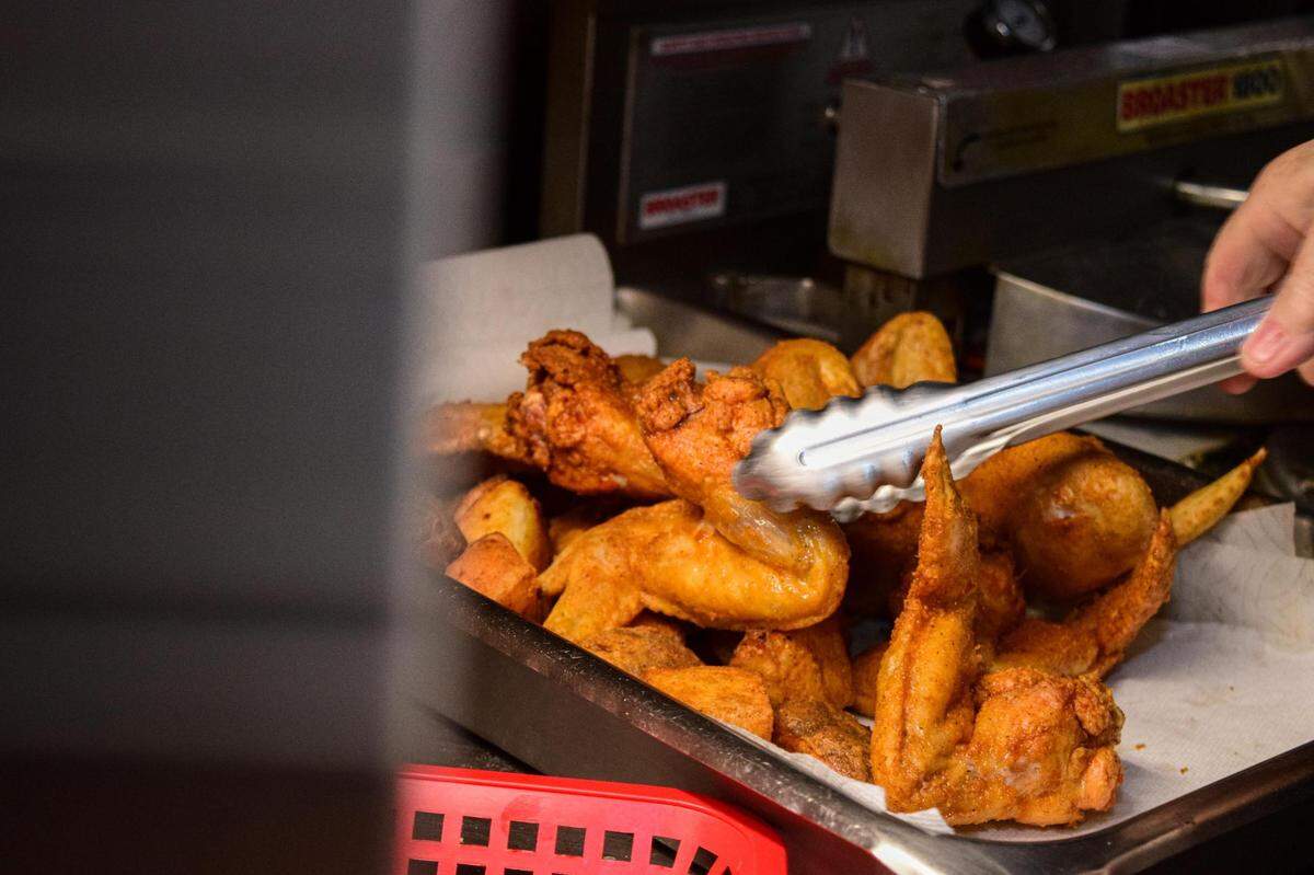 “They’re worried about the chicken,” said Peterson of her regulars. Half-birds, wings, drummies and “middles” (the non-drum part of the wing) are breaded in her own recipe and pressure-fried to crispy, juicy perfection.