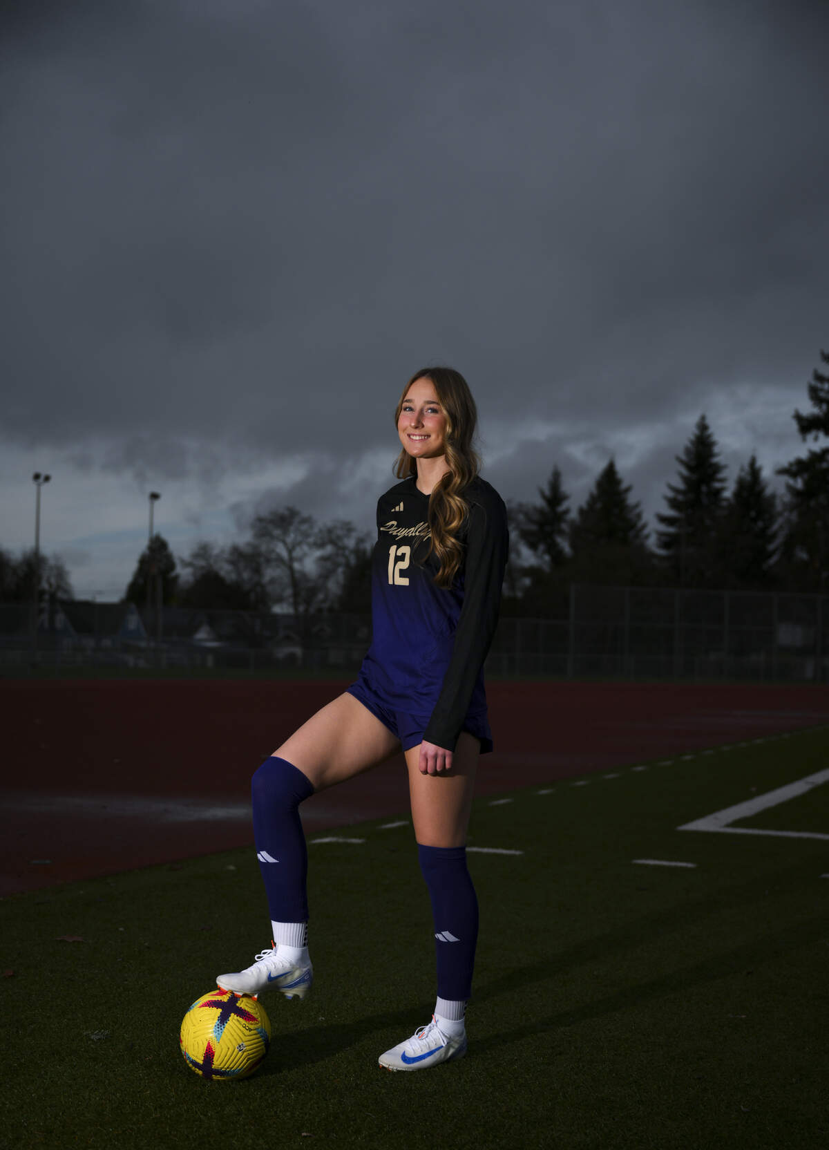 Puyallup High School forward Ella Bach, a Clemson commit and News Tribune's 2025 All-Area girls soccer player of the year poses for a portrait at Sparks Stadium, on Wednesday, Dec. 17, 2025, in Puyallup, Wash.