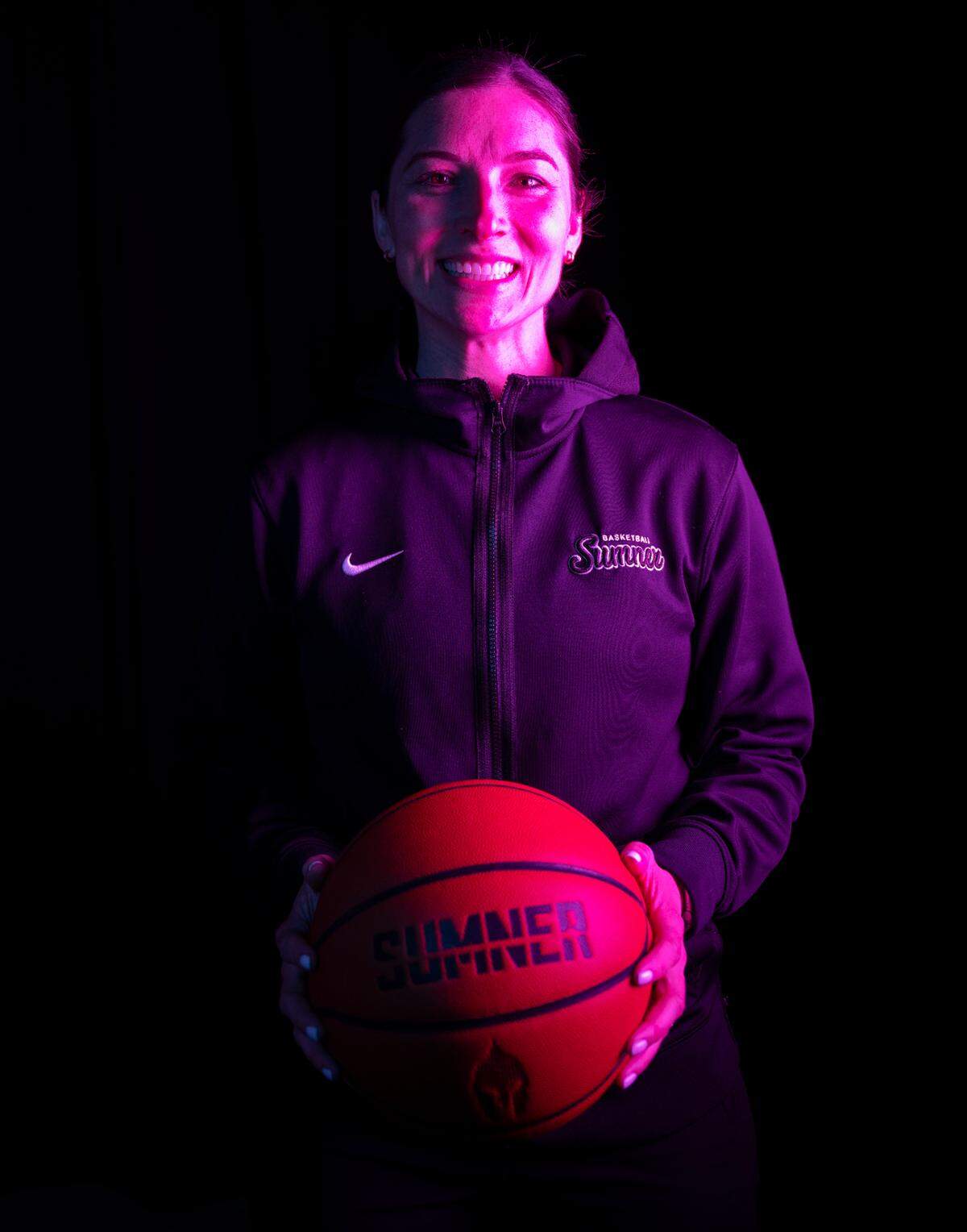 Sumner head coach Katie Hyppa poses for a portrait after being selected as The News Tribune’s 2023 All-Area basketball girls coach of the year, at Silas High School, on Sunday, March 17, 2024 in Tacoma, Wash.
