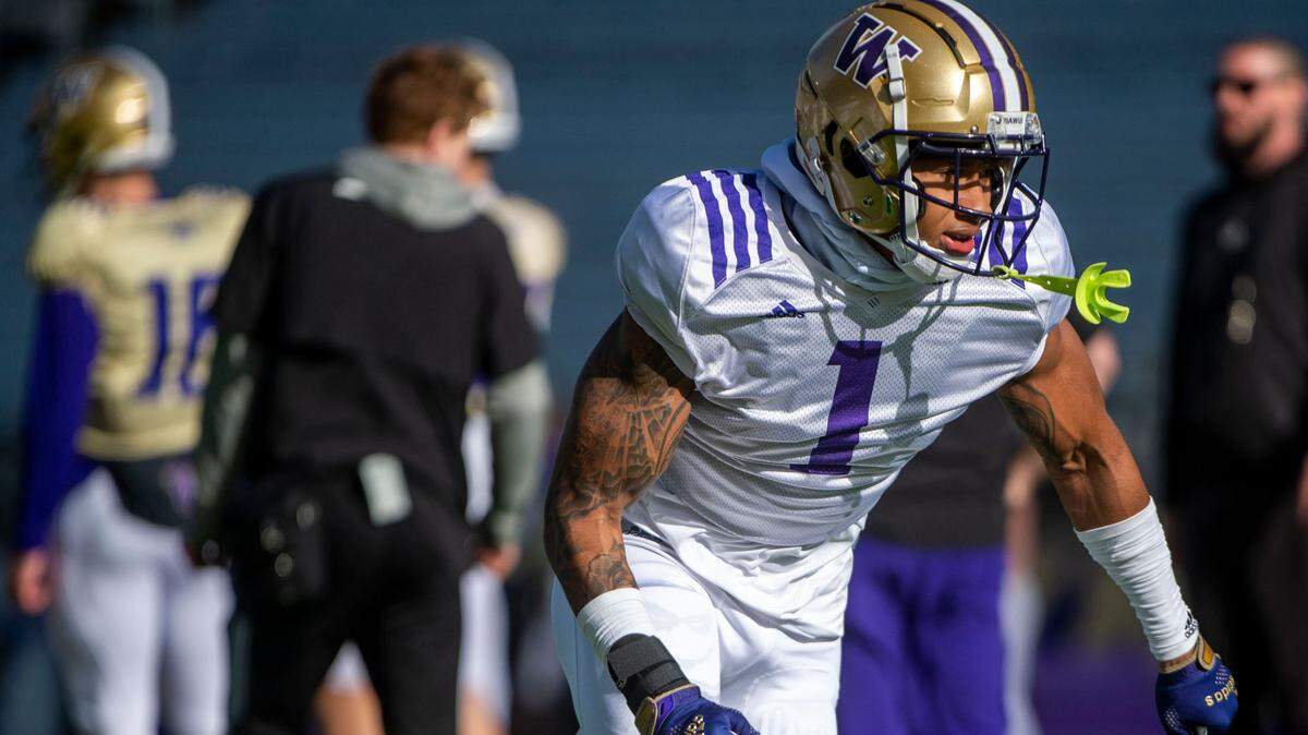 Washington cornerback Jordan Perryman works through a drill during spring practice on Friday, April 8, 2022, at Husky Stadium in Seattle.