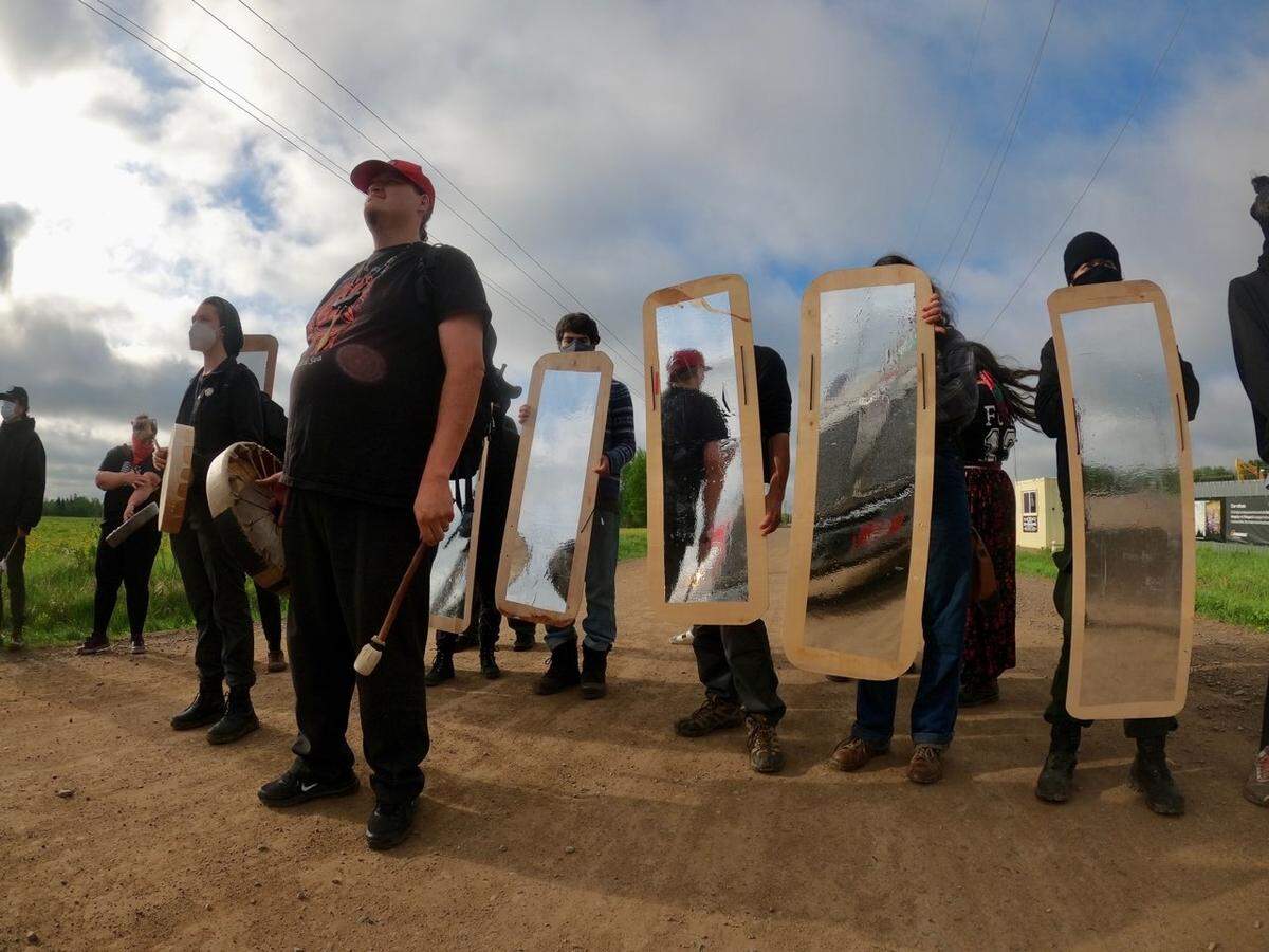 Washington State University student Greg Urquhart, who is Eastern Band Cherokee, stands with water protectors at the Dakota Access Pipeline protest in 2016. Urquhart, a military veteran, had originally intended to drop off supplies with his daughter when protesters were met with tear gas. Using his military knowledge, he provided first aid to those around him, later inspiring him to create South Sound Street Medics.