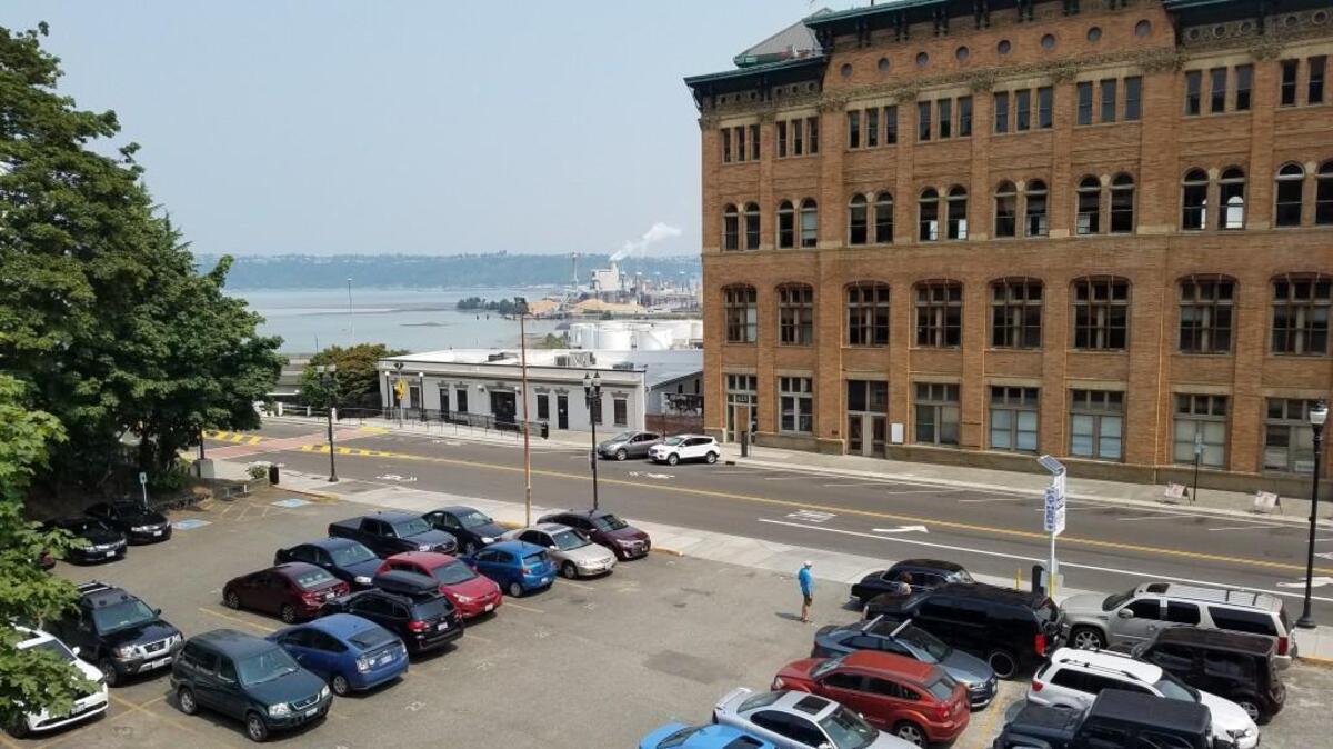 Hotel Concepts of Seattle bought a parking lot south of the Spanish Steps and west of Old City Hall last week for $1.8 million, county records show.