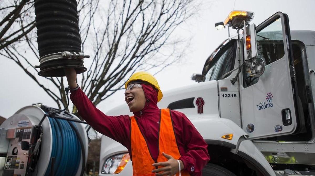 Jonathan Ramirez, a student at Mount Tahoma, tests out the suction power of a Vactor truck at the Pierce County Career Day at the Washington State Fairgrounds in Puyallup last fall. More than 2,500 students from Pierce and Thurston county schools attended the event, geared toward promoting career paths such as construction, utilities, transportation and the trades, which pay well and don’t require the debt burdens of a four-year college degree.
