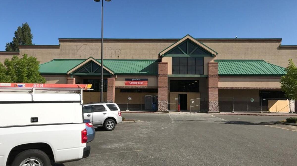 The “coming soon” banner for 24 Hour Fitness seen Thursday, May 25 from the shopping center’s parking lot at the former Albertsons/Haggen grocery, 111 S 38th St., Tacoma.