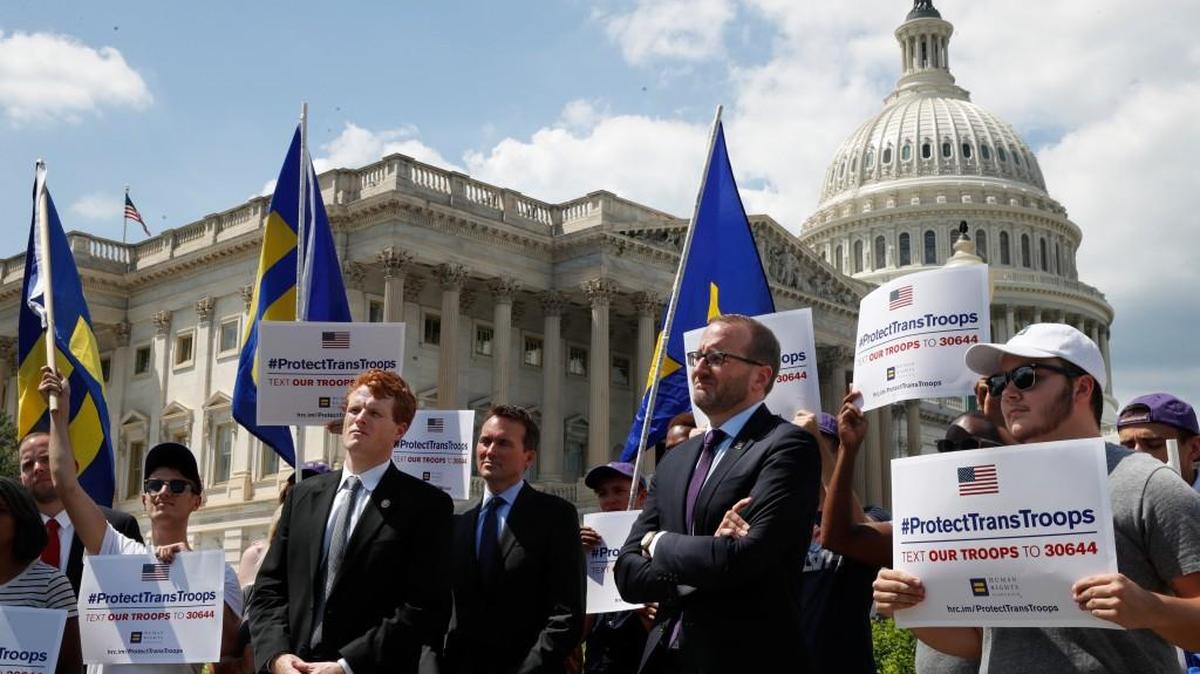 Rep. Joe Kennedy, D-Mass., third from right, listens during an event in support of transgender members of the military, Wednesday, July 26, 2017, on Capitol Hill in Washington, after President Donald Trump said he wants transgender people barred from serving in the U.S. military “in any capacity,” citing “tremendous medical costs and disruption.”