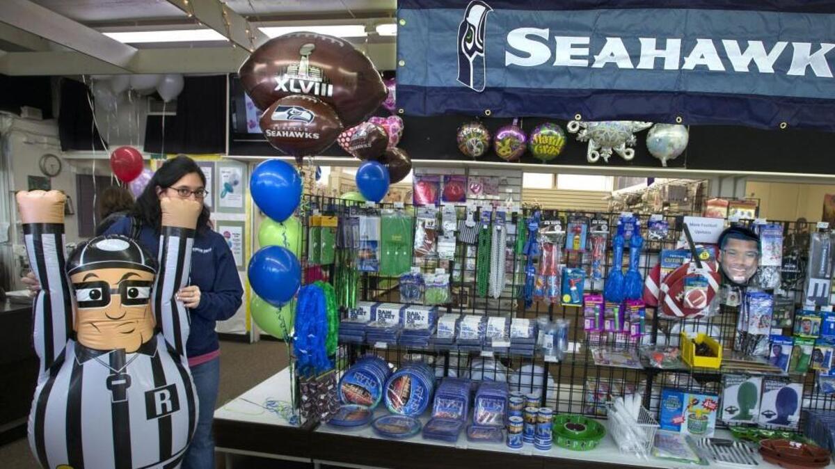 A blowup referee was a score for Seahawks fan Bev Silva at Party World in Tacoma in 2014. The store is set to close at the end of this month after nearly 40 years of operation.