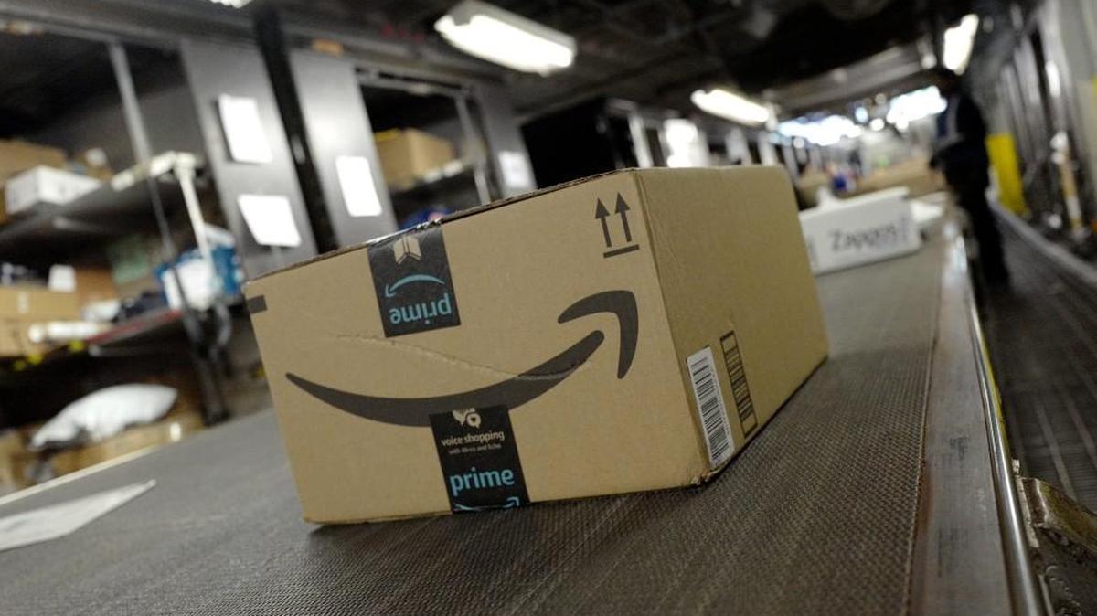 A package from Amazon Prime moves on a conveyor belt at a UPS facility, Tuesday, May 9, 2017 in New York. Prime same-day, one-day and two-day options can vary even by neighboring ZIP codes.