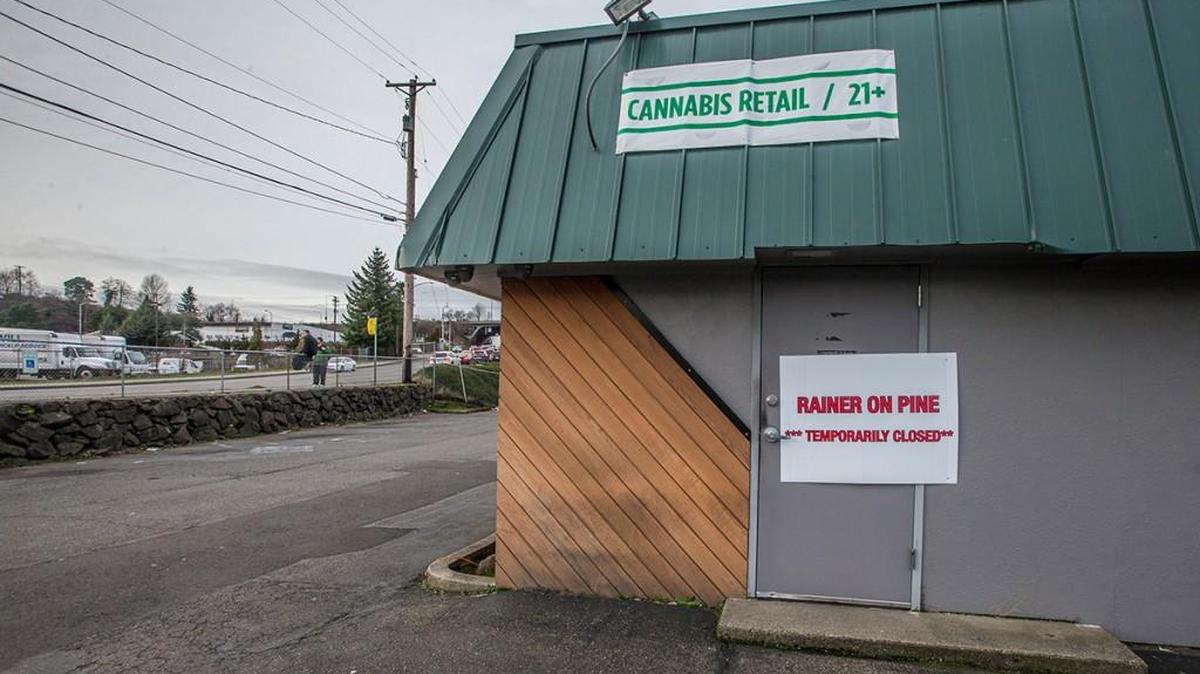 Rainier on Pine, the first marijuana retailer to open in Tacoma, was closed at noon Wednesday by the state Liquor and Cannabis Board after being delinquent on $1.4 million in taxes, a board spokesman said.