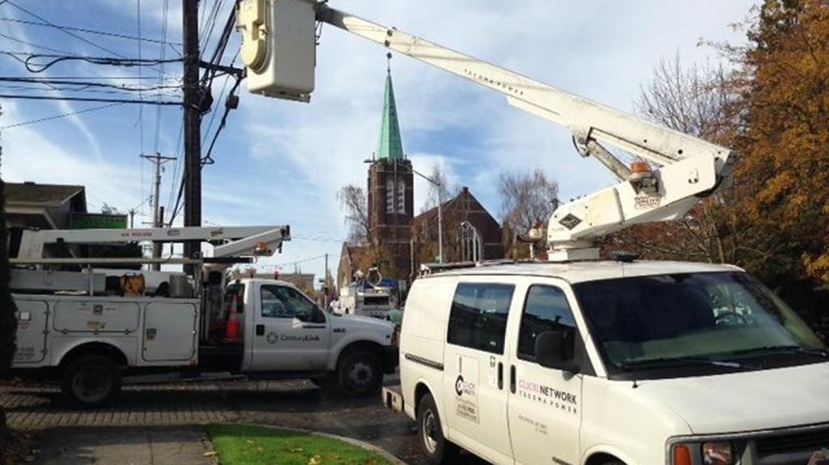 A CenturyLink and Click truck near Wright Park on Sixth Avenue in Tacoma on Tuesday.