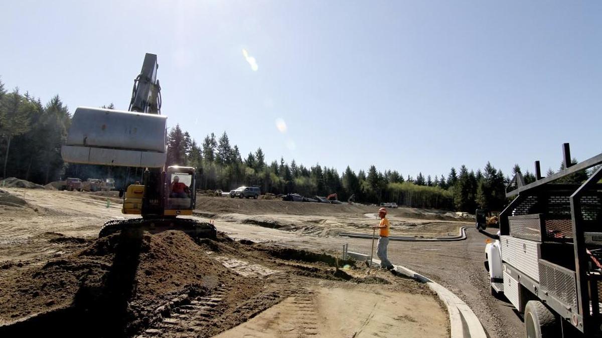 
Construction crews were busy at the Herron’s Key retirement village Tuesday morning in Gig Harbor. Pierce County added 500 construction jobs from June to July and has added 3,300 of them in the past year.
