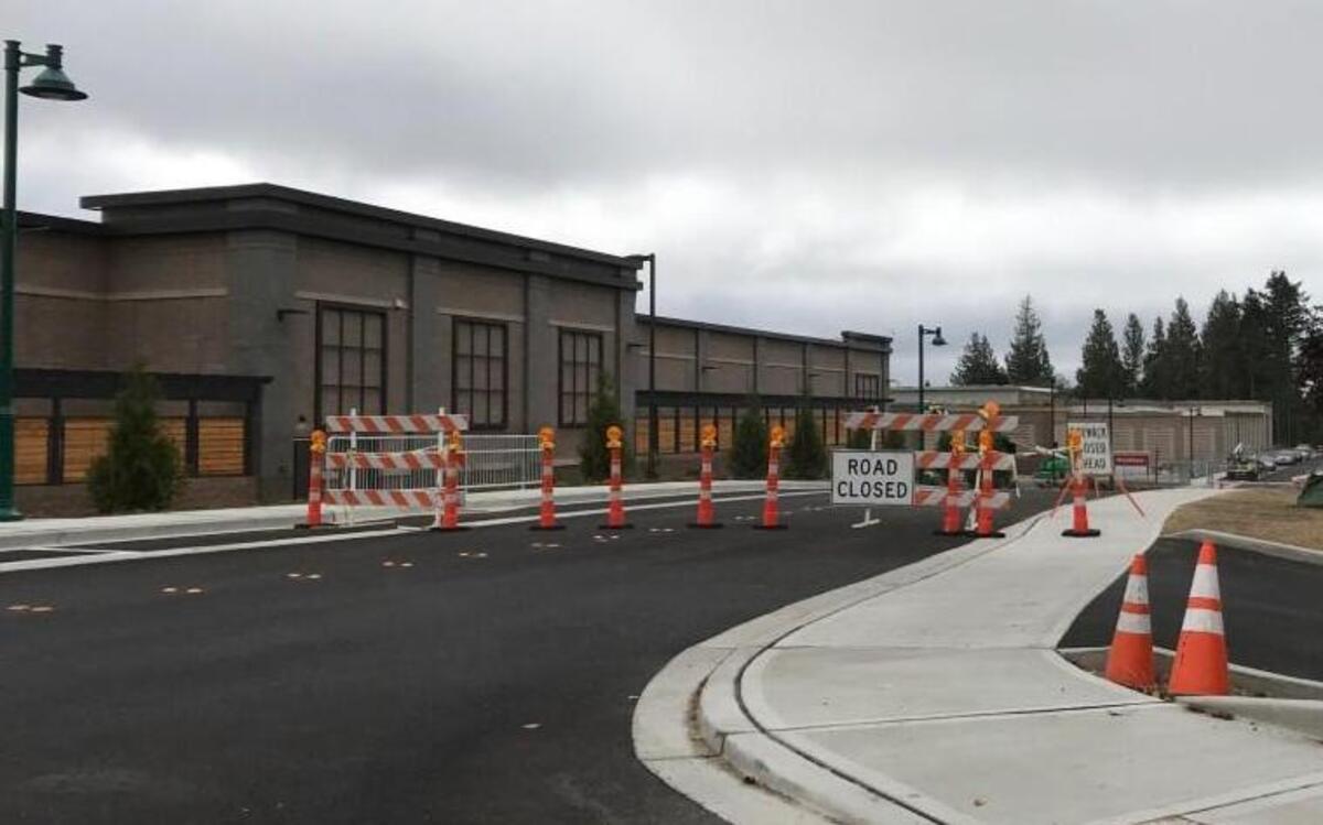 Barriers continued to block public access Thursday to 32nd Avenue near the yet-to-be-opened Fred Meyer store in Gig Harbor.