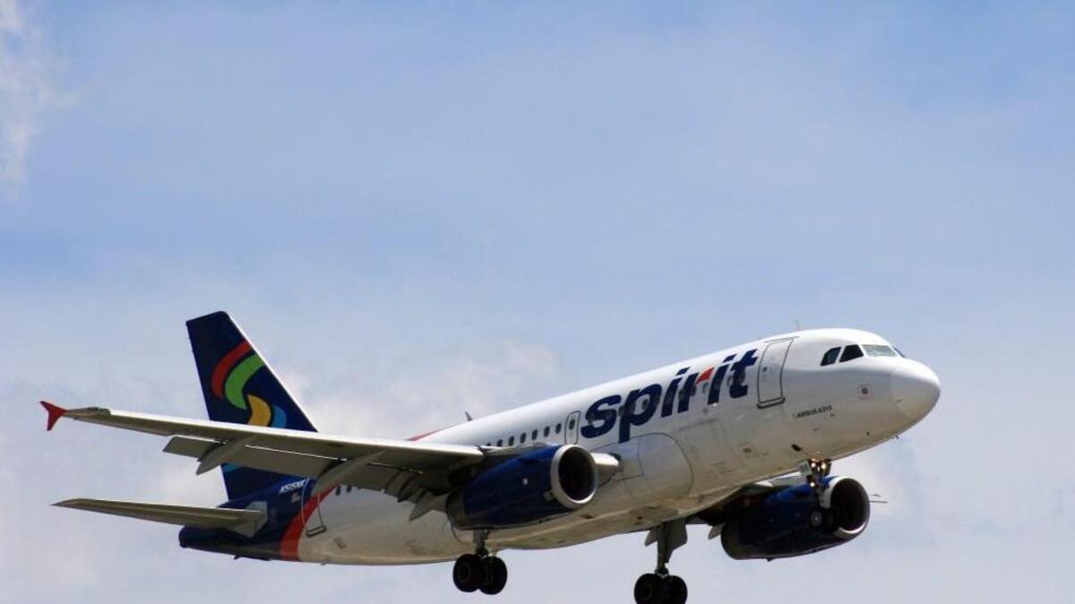 A Spirit Airlines plane approaches Chicago O'Hare International Airport in June. The airline is adding flights to Seattle-Tacoma International Airport.