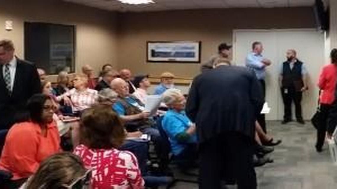 A meeting room is filled to capacity shortly before a joint study session between the Tacoma City Council and Port of Tacoma commission on Tuesday, June 28. This is a panorama view of the meeting space.