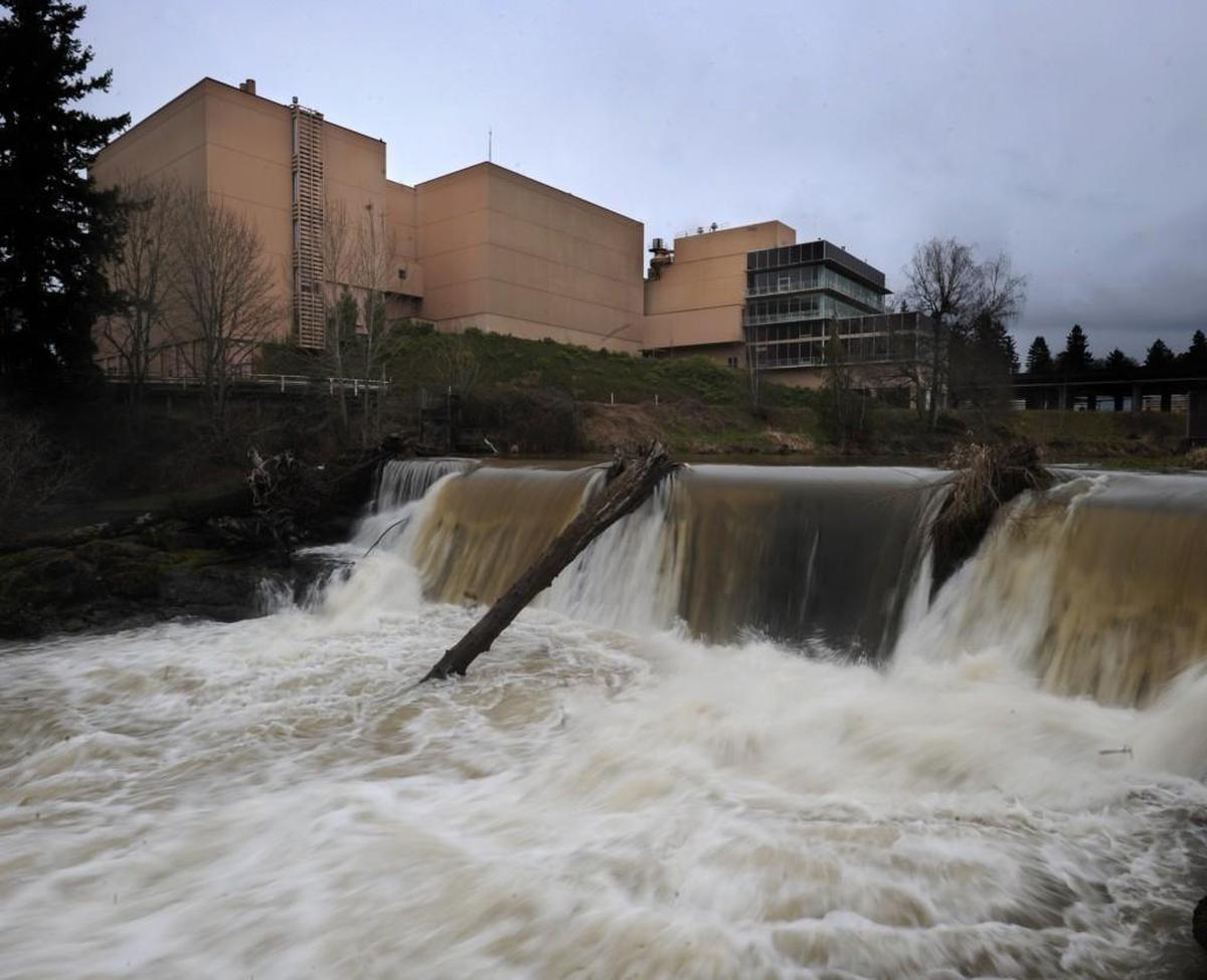 The Olympia brewery, in Tumwater, is shown in March 2011 with the Deschutes River in the foreground.