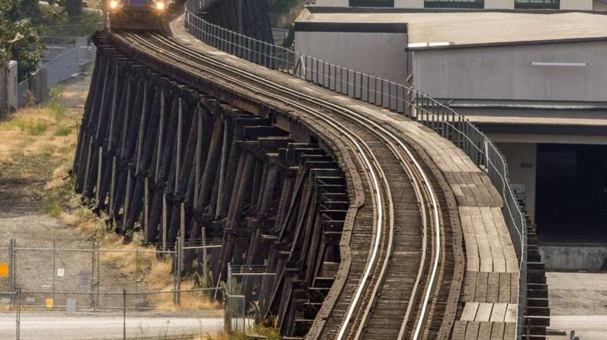 
A Sounder train traverses a railroad trestle heading east from Freighthouse Square on Monday at the Tacoma Dome station. The trestle is expected to be replaced.

