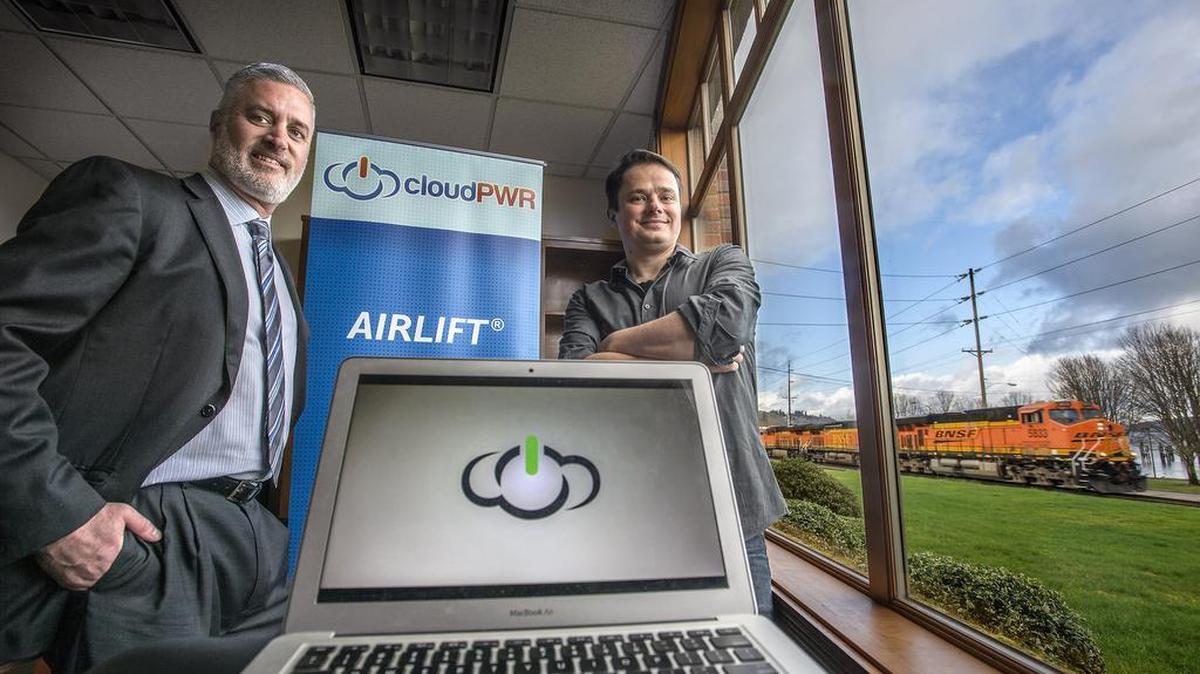 Tacoma software firm cloudPWR has the contract to create an online-based registry for medical marijuana patients for the state of Washington. It will go online July 1. Staff at medical marijuana stores will use the online portal being developed by cloudPWR Senior Systems Engineer Mathias Eichler, right, and CEO Shadrach White, to enter information on patients and issue ID cards.
