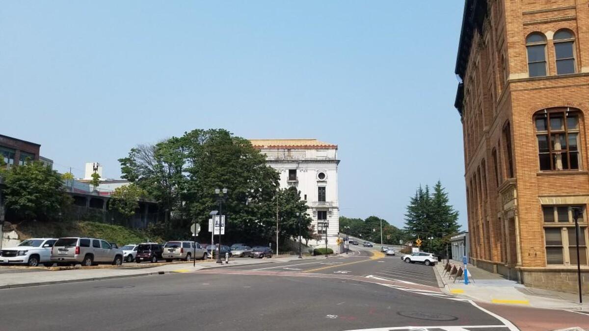 Hotel Concepts of Seattle bought a parking lot south of the Spanish Steps and west of Old City Hall last week for $1.8 million, county records show.