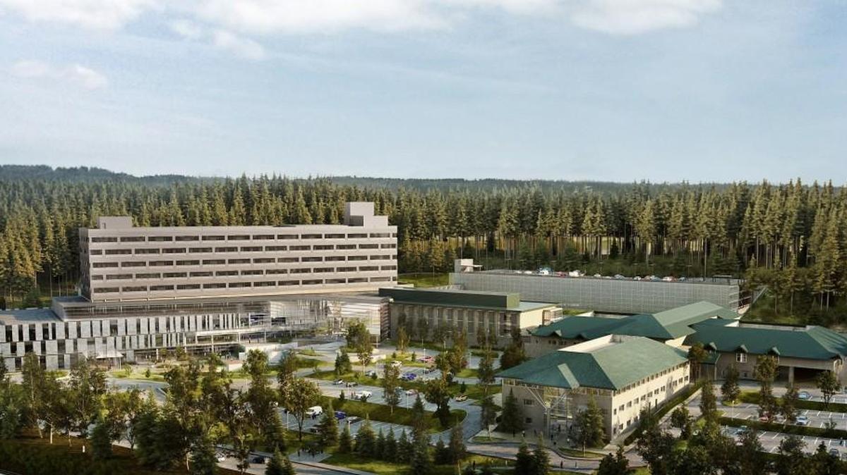 An artist’s rendering of Harrison Medical Center in Silverdale after construction. Included are the existing building and a parking garage.