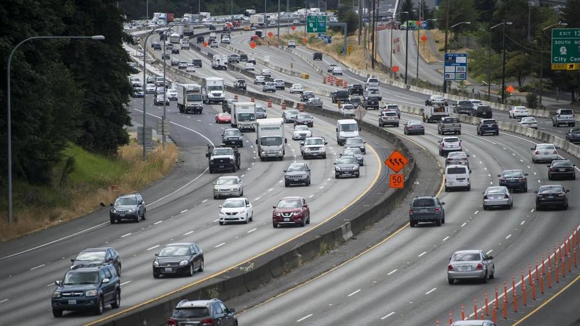 Traffic moves along Interstate 5 through Tacoma. It’s a long trek to Seattle from the Tacoma area, but the payoff can be cheaper rent for those willing to do it.