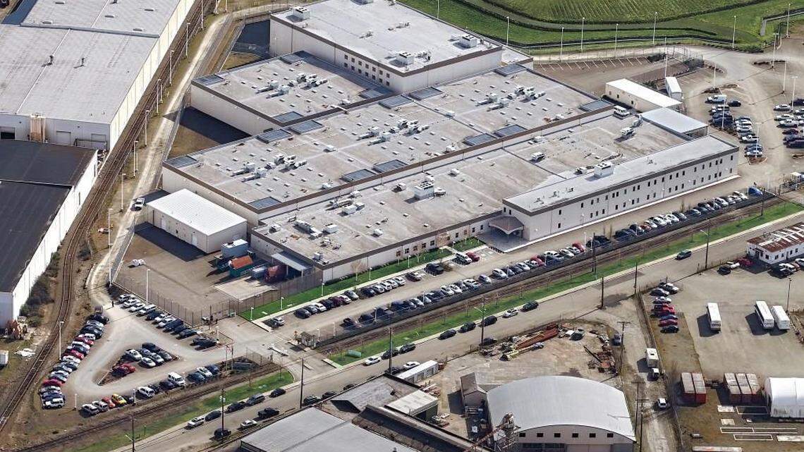 The Northwest Detention Center, a privately owned and operated immigration detention center was built on the Tacoma Tideflats to replace a similar facility in Seattle. Opening in 2004 with a 500-bed capacity, the NWDC has since expanded capacity three times into a facility with 1,575 beds, making it one of the largest immigration detention centers in the U.S. Aerial photo taken in Spring of 2012.