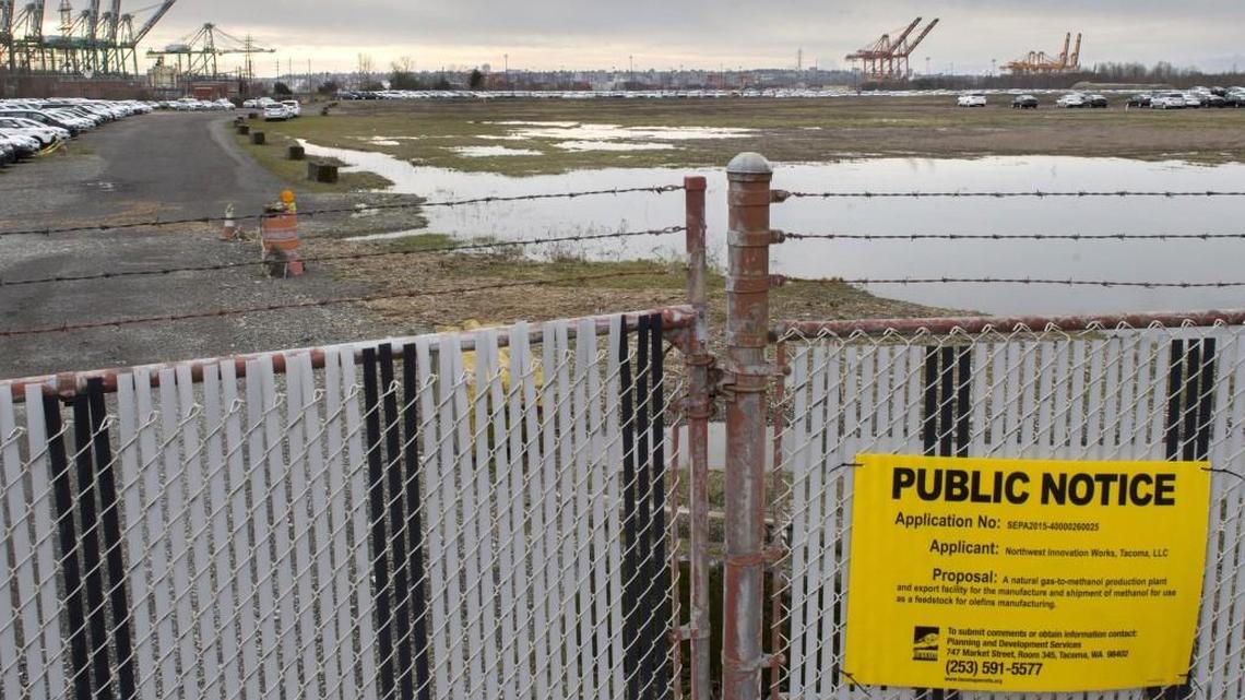 Public notification of Northwest Innovation Works' application to build a methanol production facility is posted outside the gates of the former Kaiser Aluminum property. The Port of Tacoma bought and cleaned up the property after the smelter halted work more than a dozen years ago. In 2014, Northwest Innovation Works signed a 30-year lease with the port to build a proposed 125-acre methanol production facility on the property.
