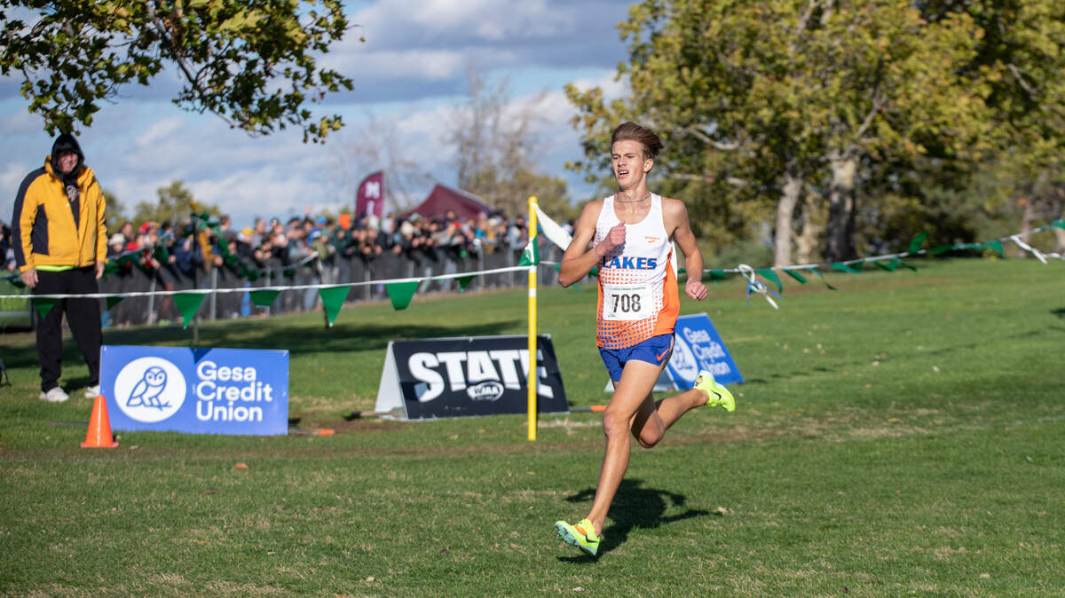 Lakes’ Cruize Corvin easily outpaced his 3A competitors Saturday at the state cross country championships in Pasco, on the way to a state title. (Aiden Whitaker for The Tri-City Herald)