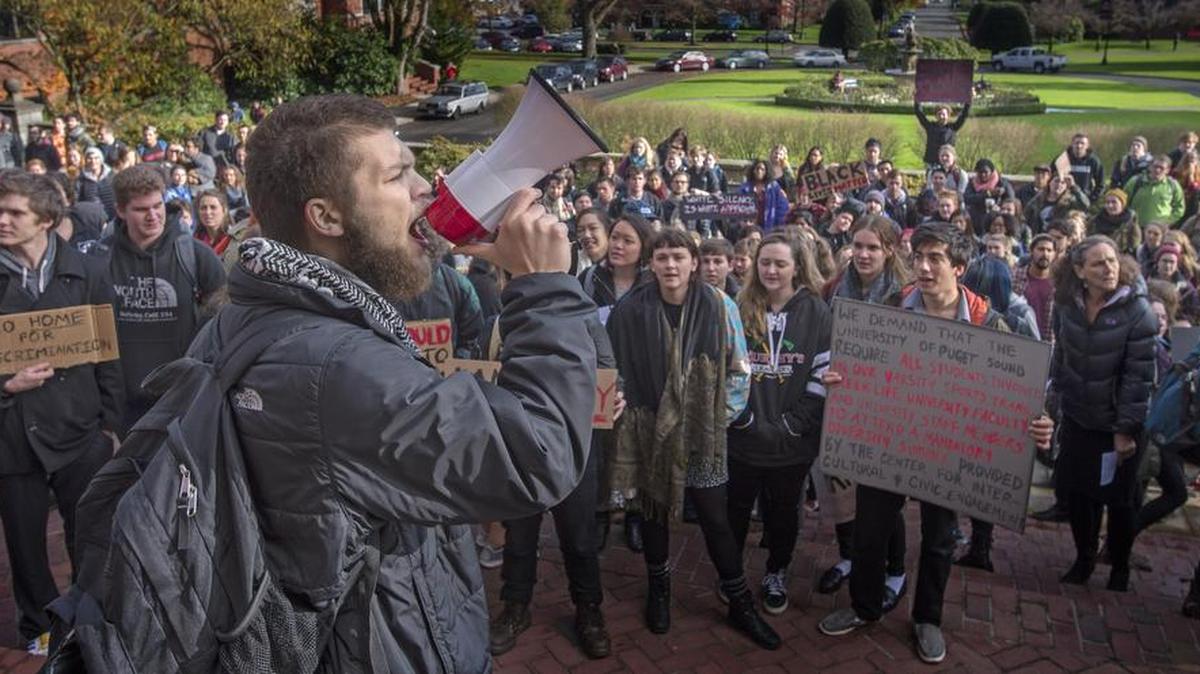 Layth Sabbagh with Puget Sound Student Union leads protesters requesting more equity for minority students Thursday at the University of Puget Sound.